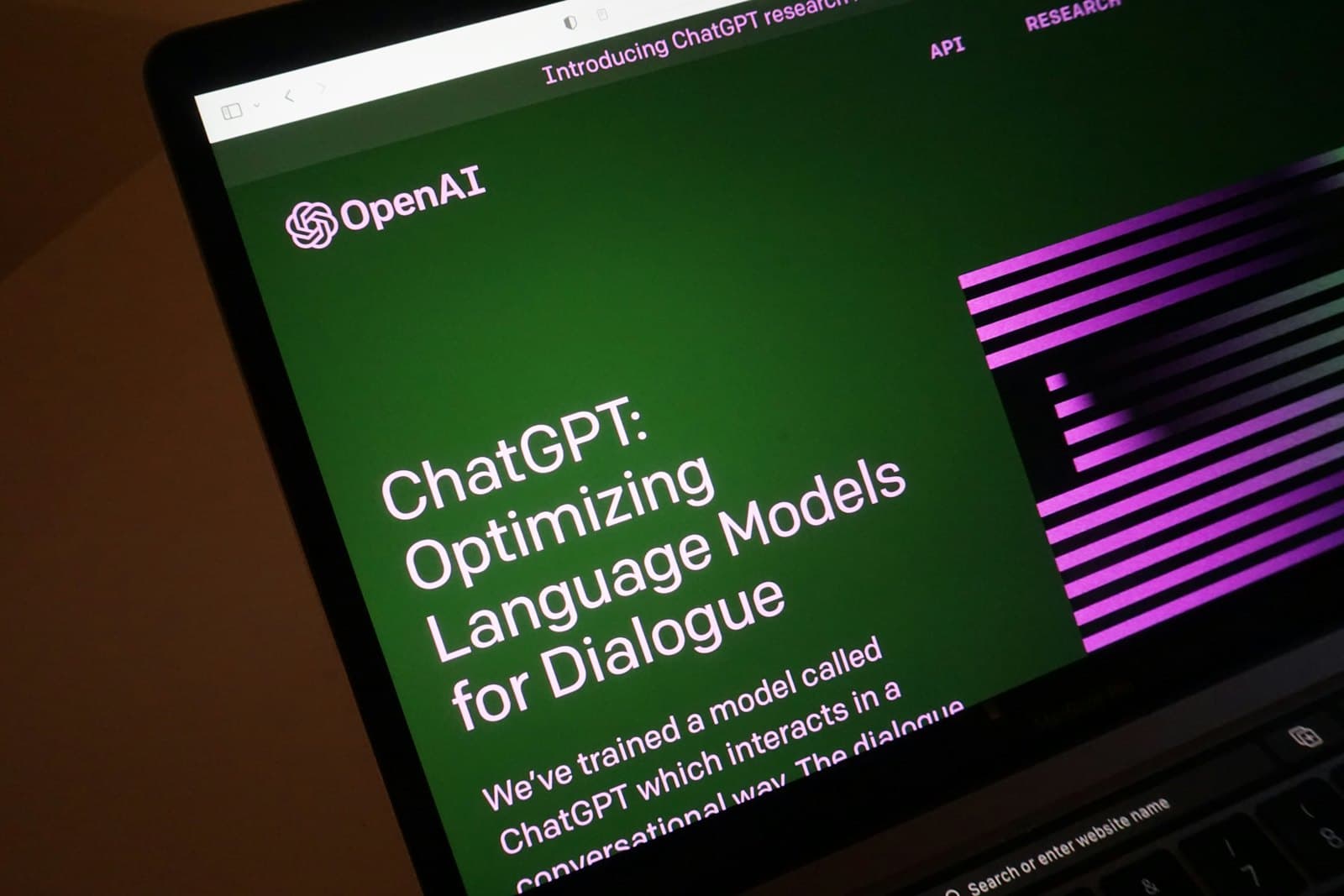 A laptop screen showing a ChatGPT web page.
